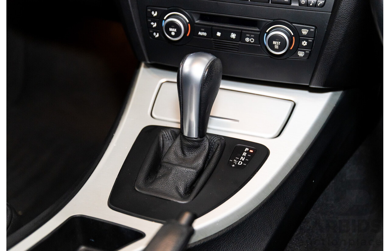 2/2007 BMW 320i Executive E90 4d Sedan Black Sapphire Metallic 2.0L