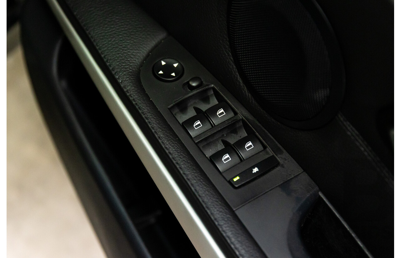 2/2007 BMW 320i Executive E90 4d Sedan Black Sapphire Metallic 2.0L