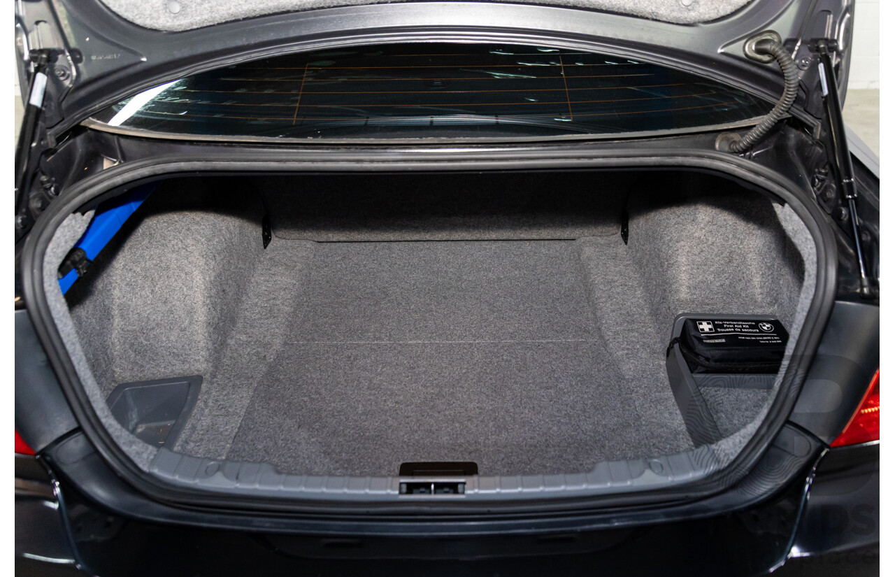 2/2007 BMW 320i Executive E90 4d Sedan Black Sapphire Metallic 2.0L