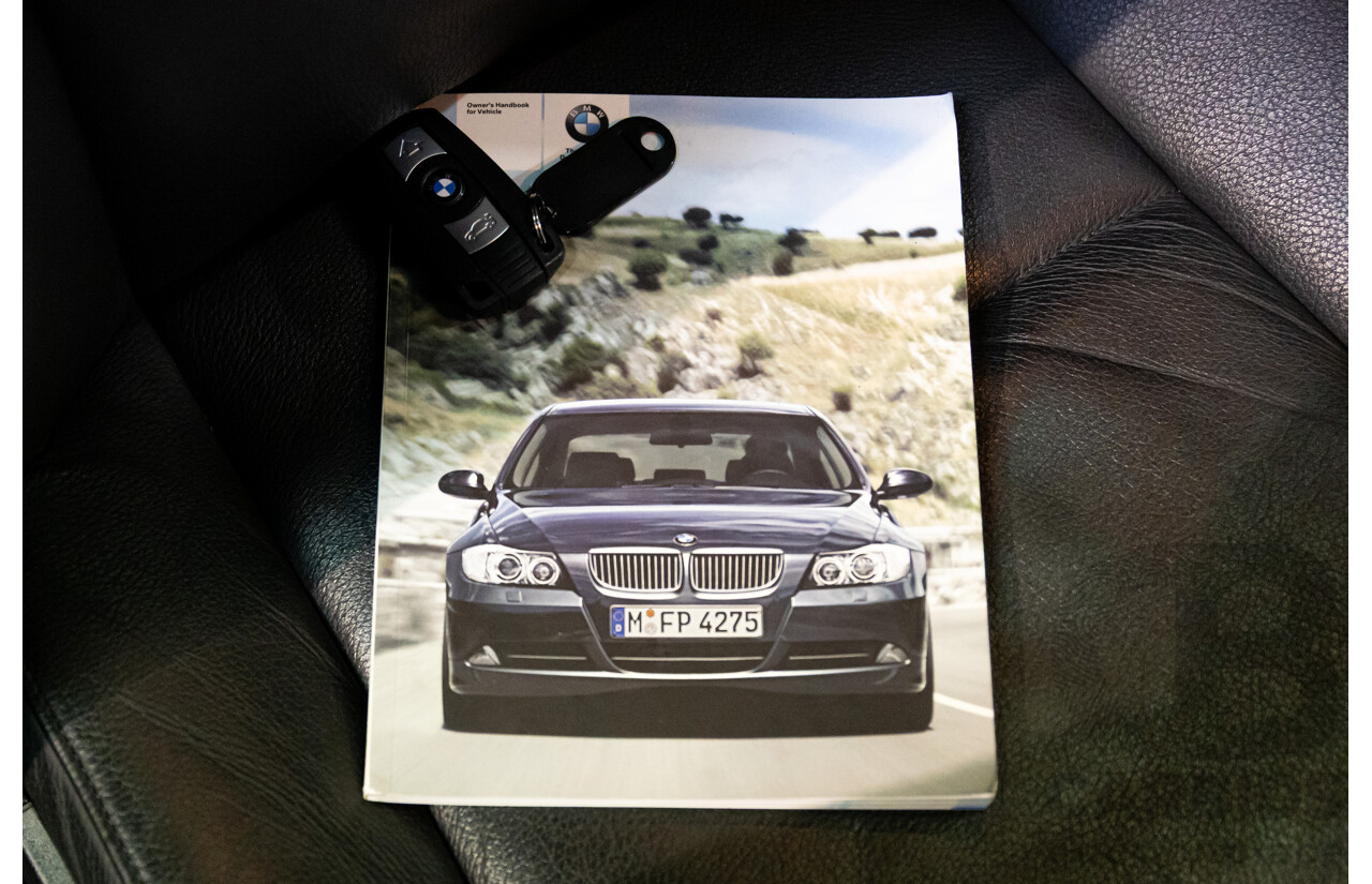 2/2007 BMW 320i Executive E90 4d Sedan Black Sapphire Metallic 2.0L