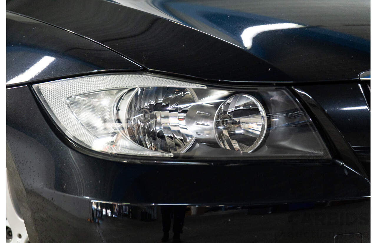 2/2007 BMW 320i Executive E90 4d Sedan Black Sapphire Metallic 2.0L