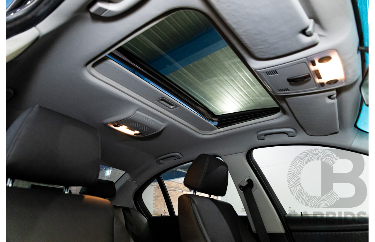 2/2007 BMW 320i Executive E90 4d Sedan Black Sapphire Metallic 2.0L