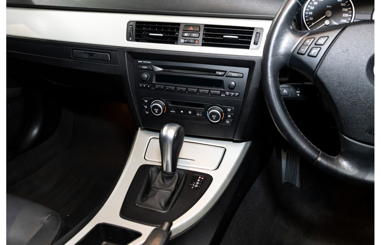 2/2007 BMW 320i Executive E90 4d Sedan Black Sapphire Metallic 2.0L