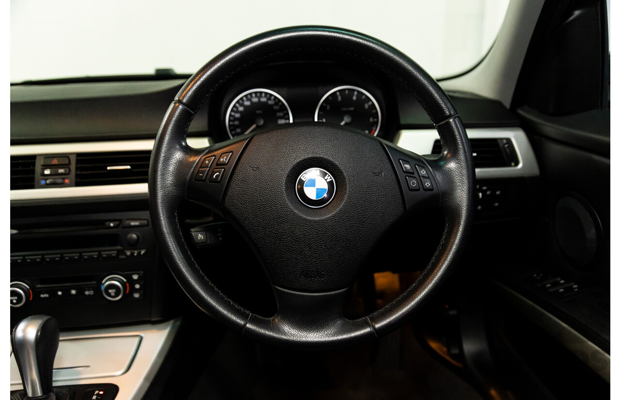 2/2007 BMW 320i Executive E90 4d Sedan Black Sapphire Metallic 2.0L