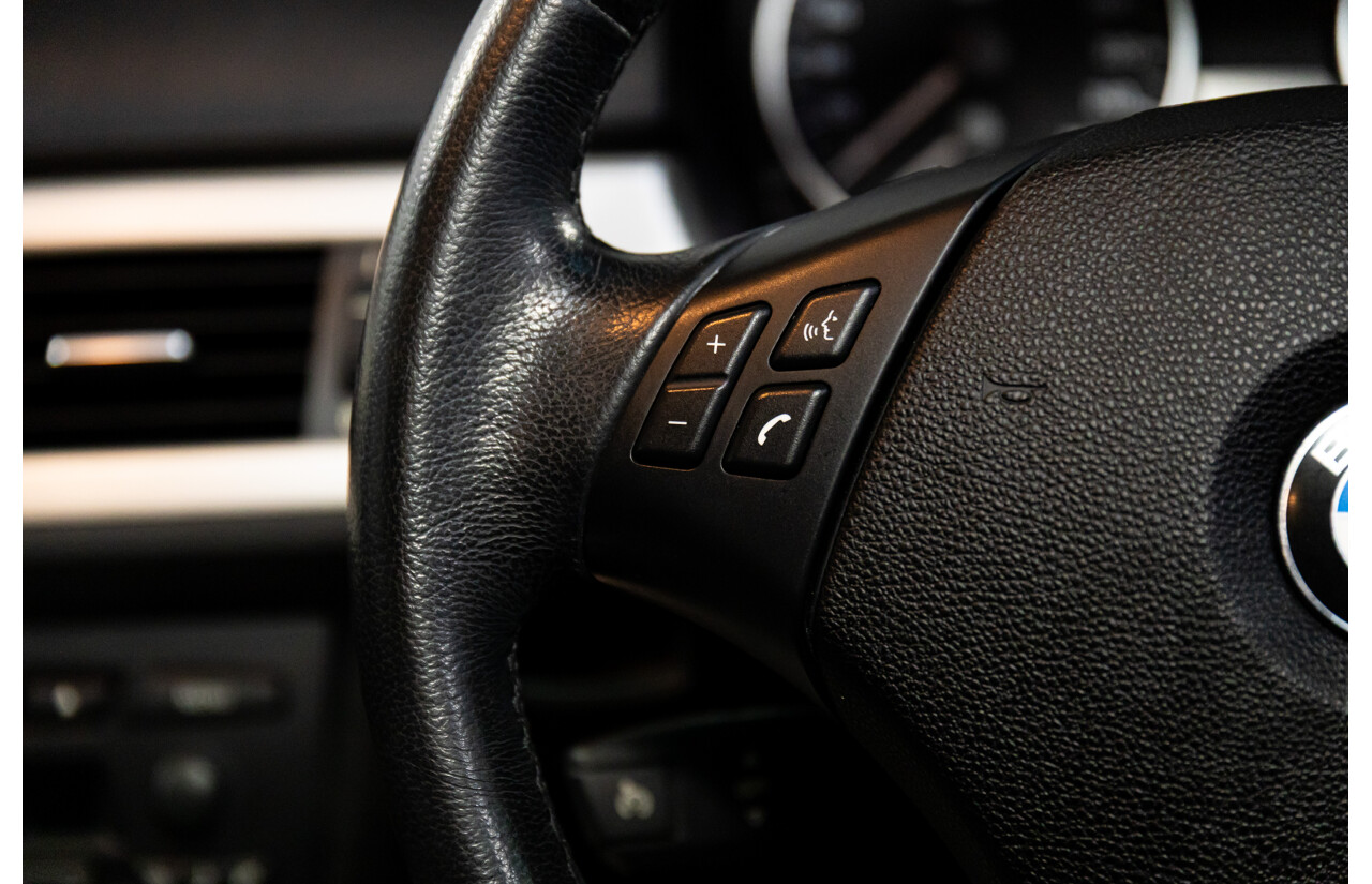 2/2007 BMW 320i Executive E90 4d Sedan Black Sapphire Metallic 2.0L