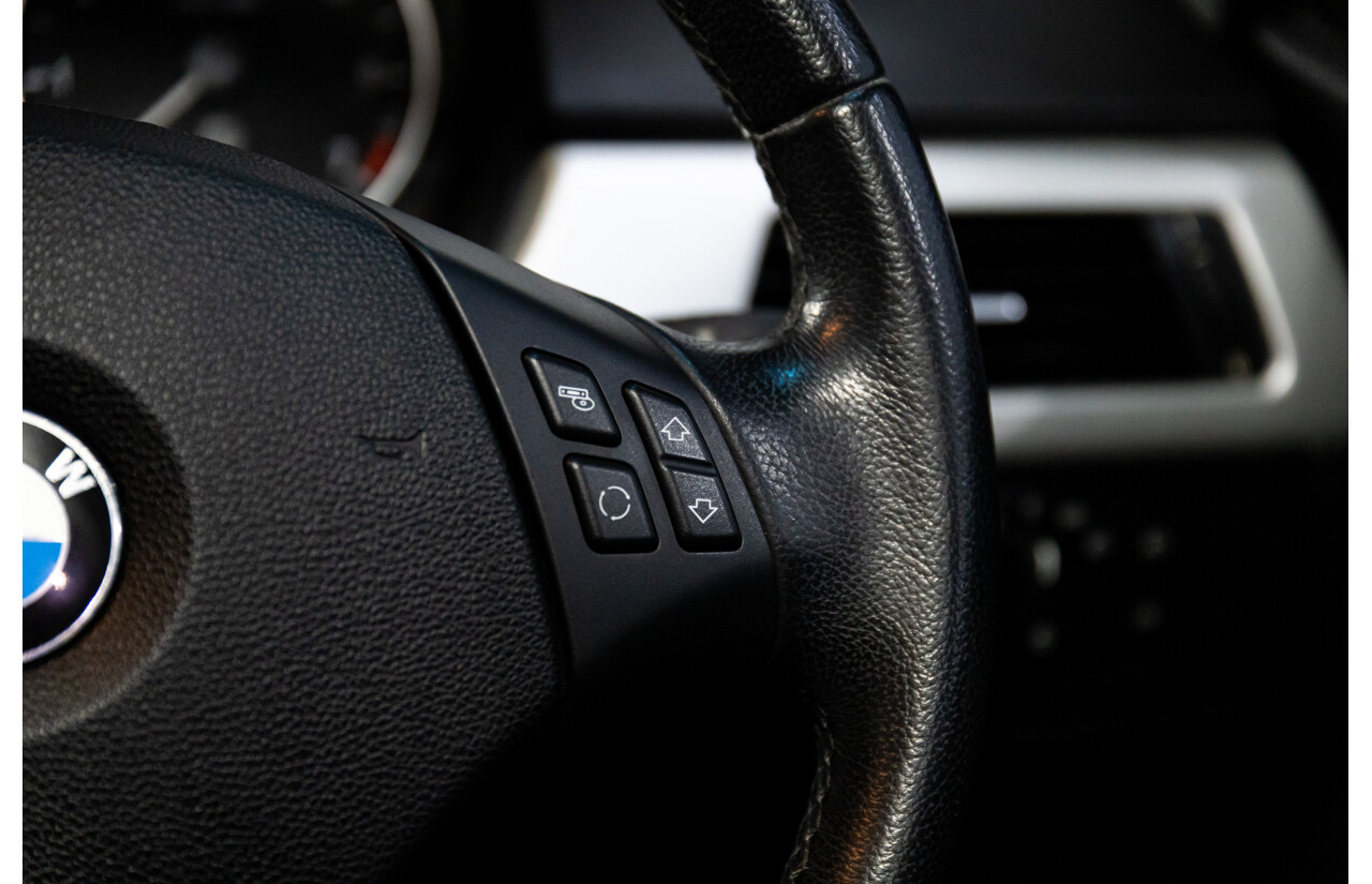 2/2007 BMW 320i Executive E90 4d Sedan Black Sapphire Metallic 2.0L