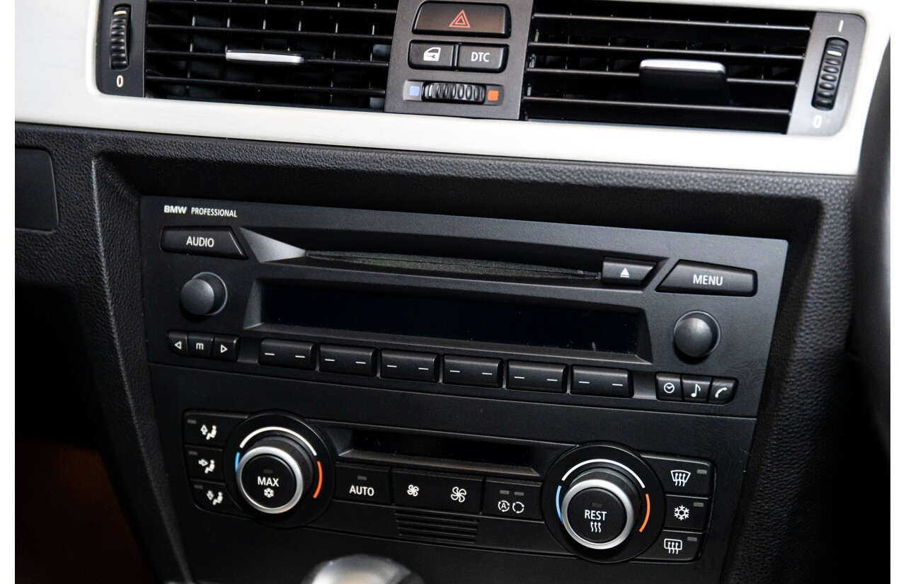 2/2007 BMW 320i Executive E90 4d Sedan Black Sapphire Metallic 2.0L