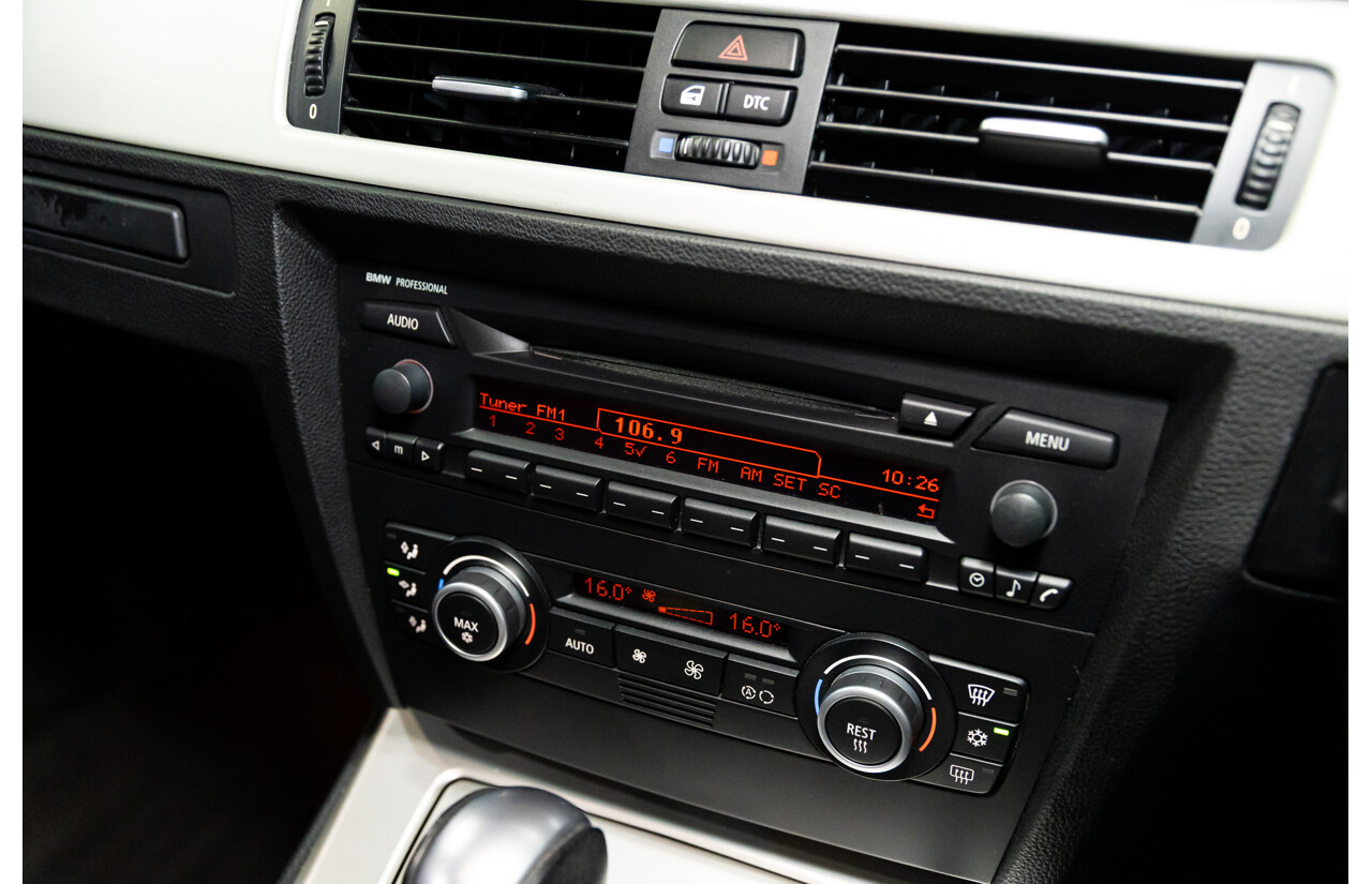 2/2007 BMW 320i Executive E90 4d Sedan Black Sapphire Metallic 2.0L