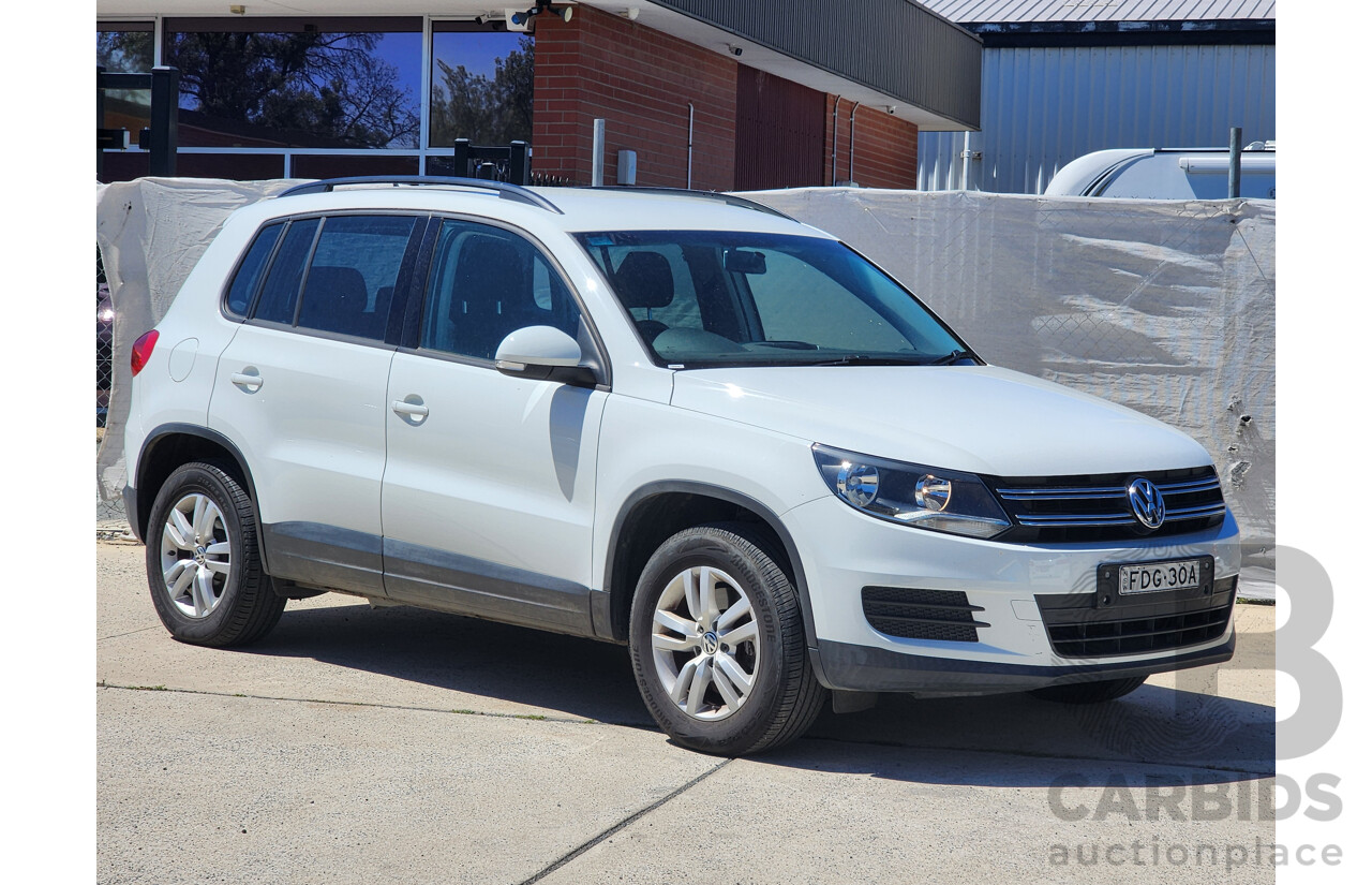 6/2015 Volkswagen Tiguan 118 TSI (4x2) 5NC MY15 4d Wagon White 1.4L