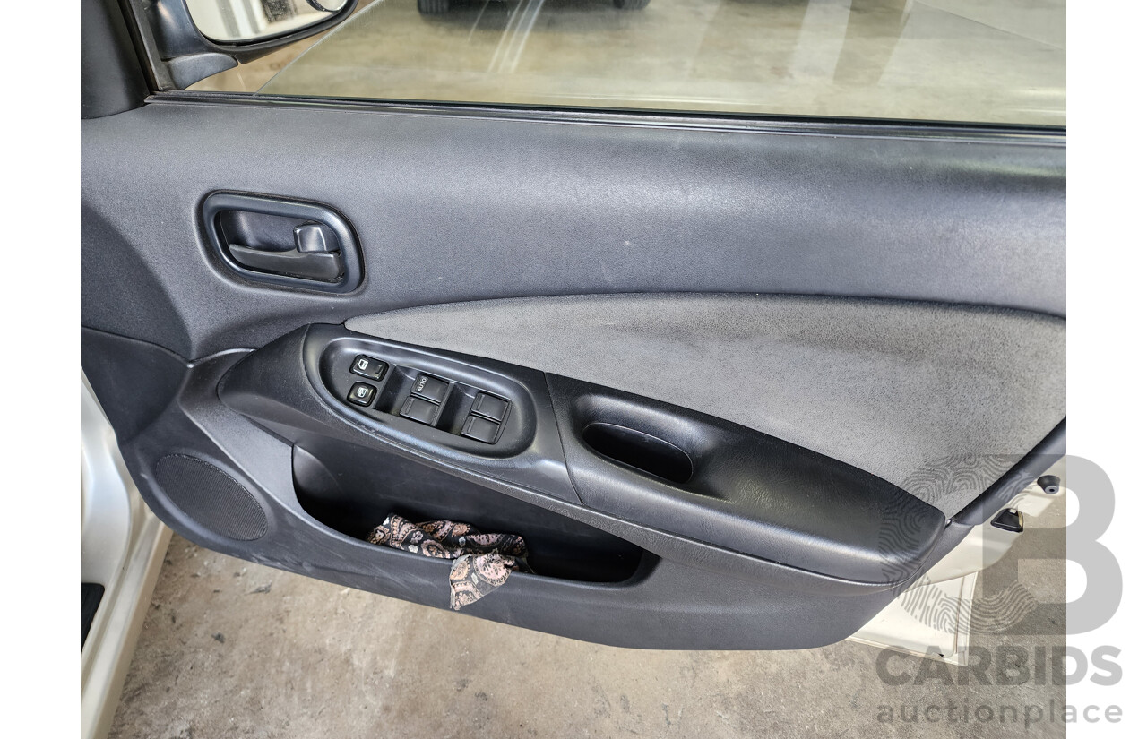 11/2003 Nissan Pulsar Q N16 MY03 4d Sedan Gold 1.8L