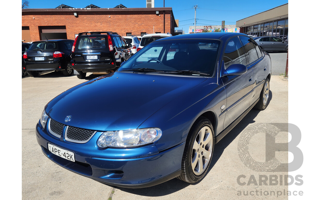 8/2002 Holden Commodore Equipe VXII 4d Sedan Blue 3.8L