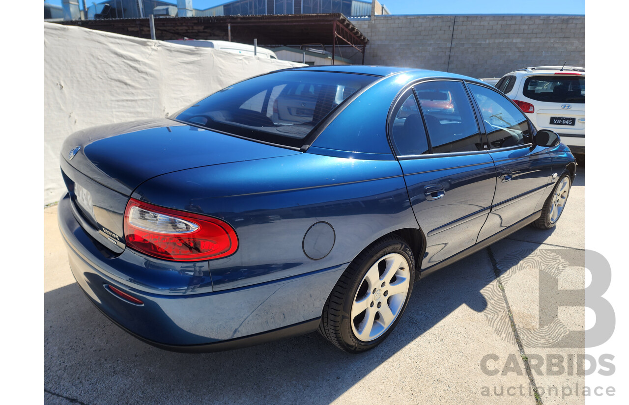 8/2002 Holden Commodore Equipe VXII 4d Sedan Blue 3.8L