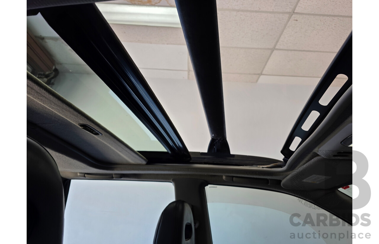 11/2004 Nissan X-Trail Ti-L (sunroof) (4x4) T30 4d Wagon Black 2.5L