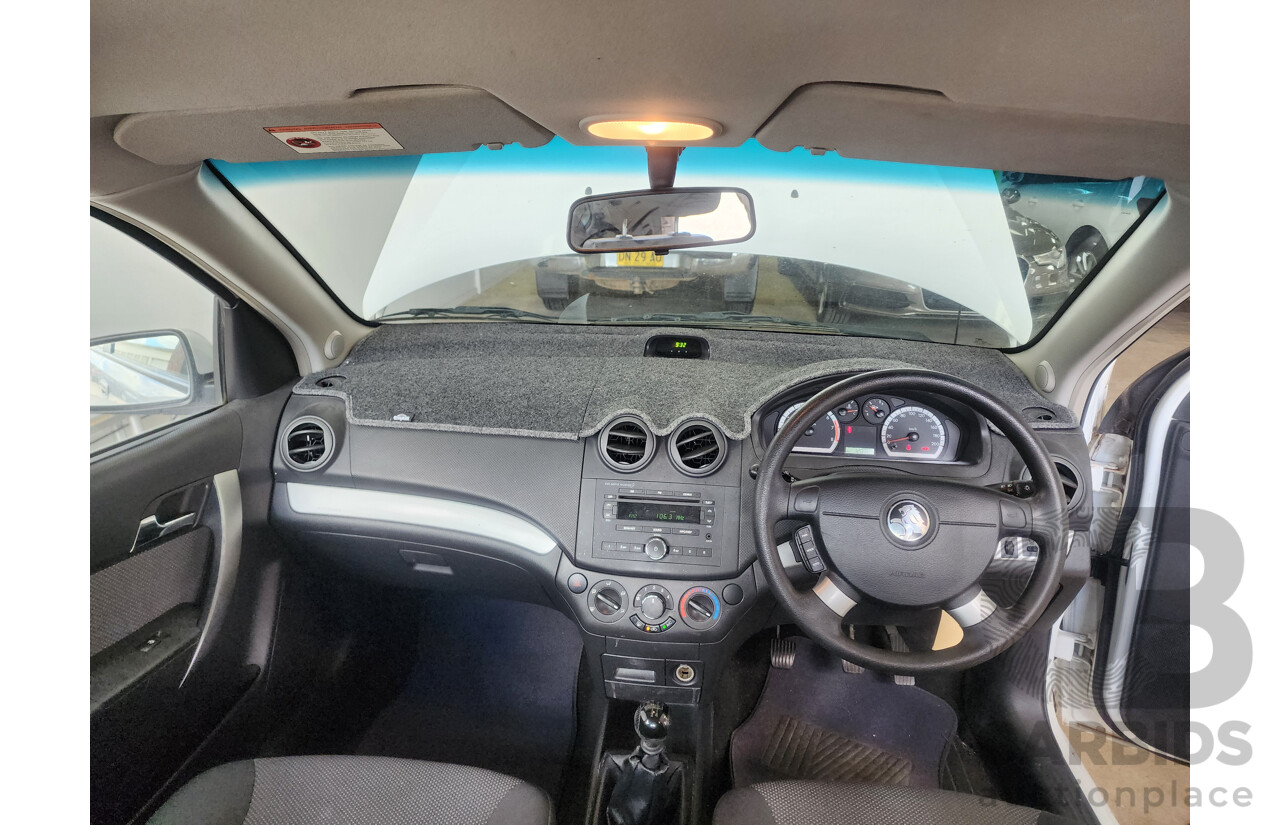 9/2011 Holden Barina  TK MY11 5d Hatchback White 1.6L