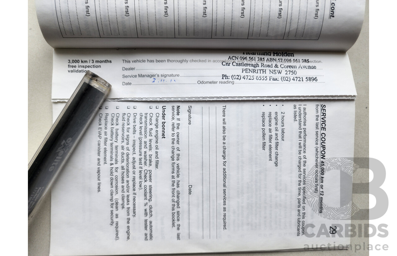 9/2011 Holden Barina  TK MY11 5d Hatchback White 1.6L