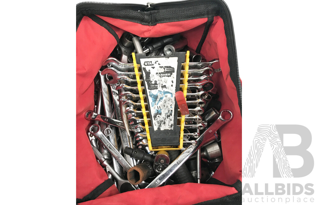 Milwaukee Tool Bag with Various Tools Such as Wrenches, Spanners, and More