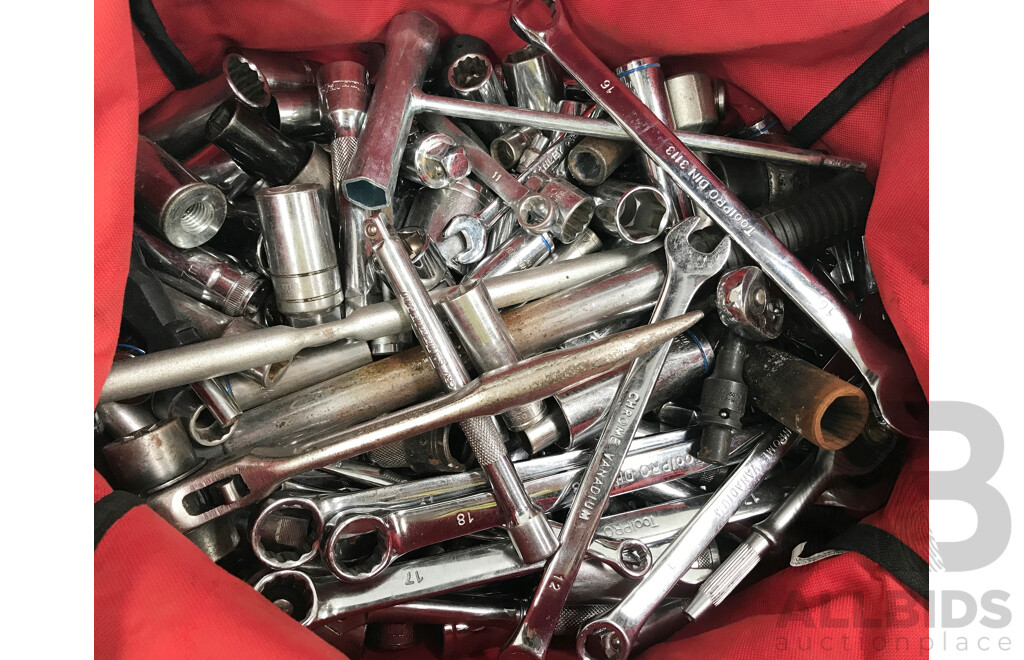 Milwaukee Tool Bag with Various Tools Such as Wrenches, Spanners, and More