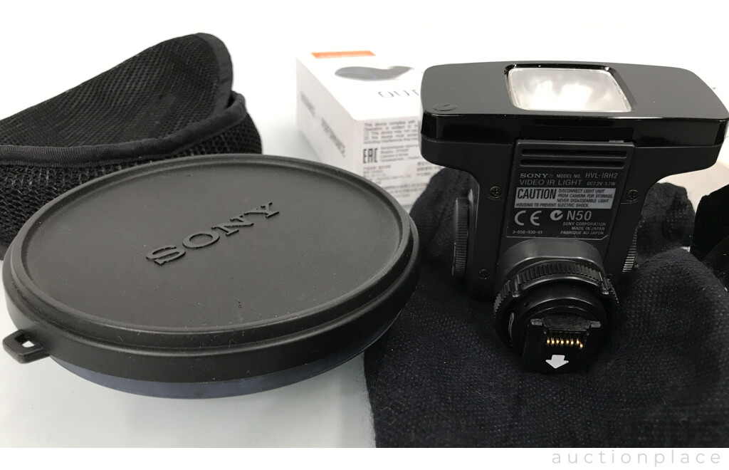 Creative Outlier Air Wireless Earphones, Kogan Power Bank, and Assorted Sony Camera Lenses and Video Light