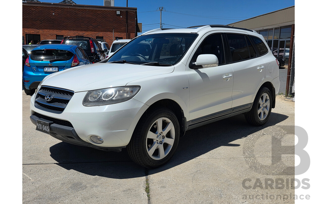 9/2009 Hyundai Santa Fe Elite CRDi (4x4) CM MY09 UPGRADE 4d Wagon White Turbo Diesel 2.2L