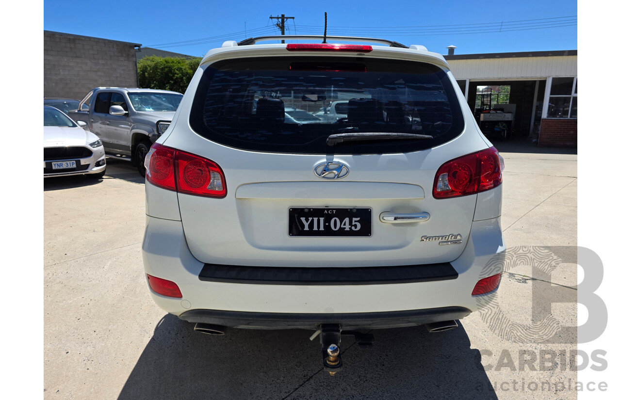 9/2009 Hyundai Santa Fe Elite CRDi (4x4) CM MY09 UPGRADE 4d Wagon White Turbo Diesel 2.2L