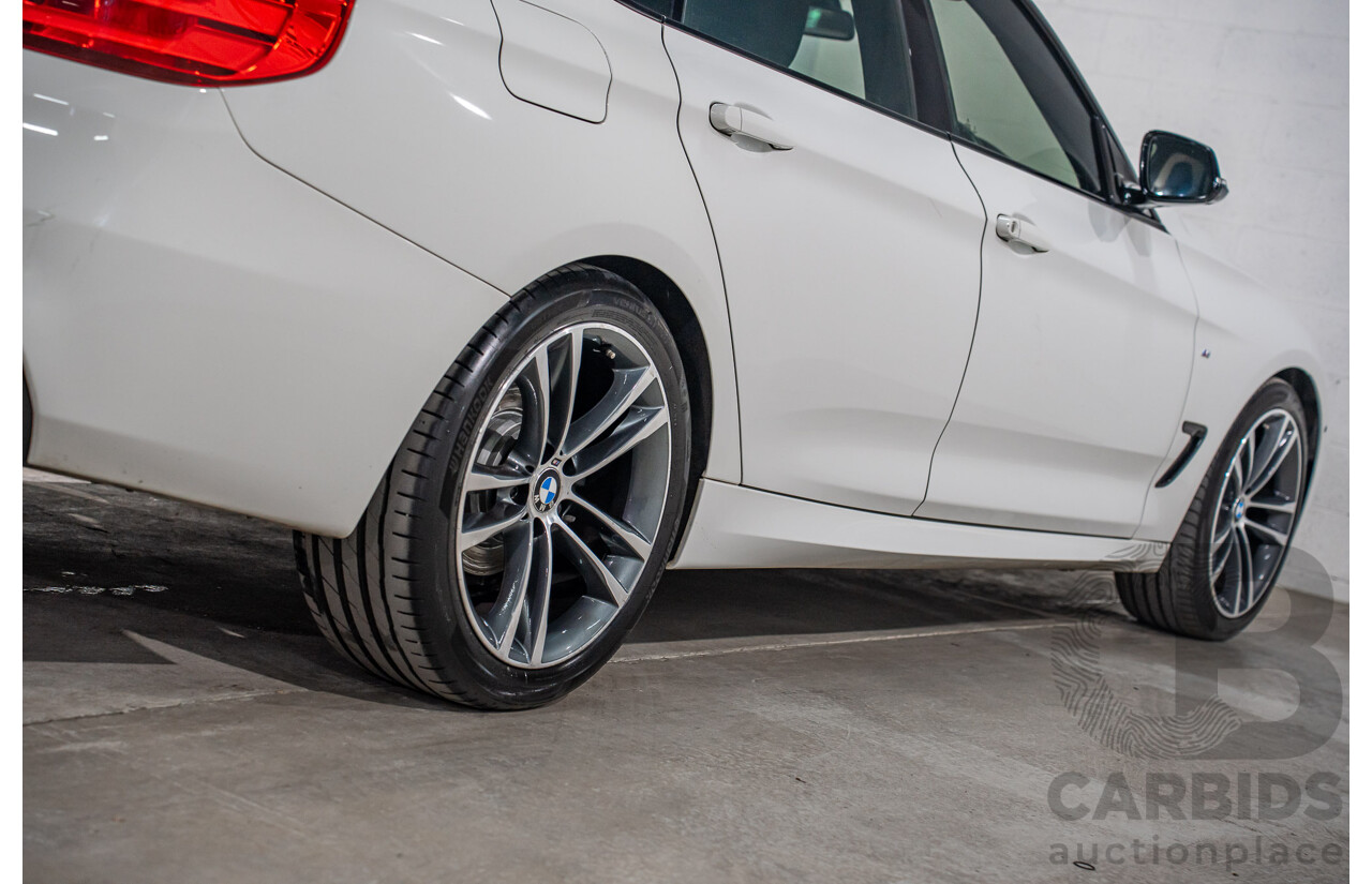 9/2014 BMW 328i Gran Turismo Sport F34 MY15 4d Coupe Alpine White Turbo 2.0L