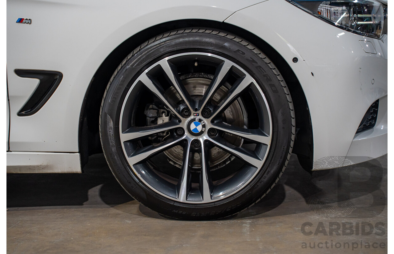 9/2014 BMW 328i Gran Turismo Sport F34 MY15 4d Coupe Alpine White Turbo 2.0L