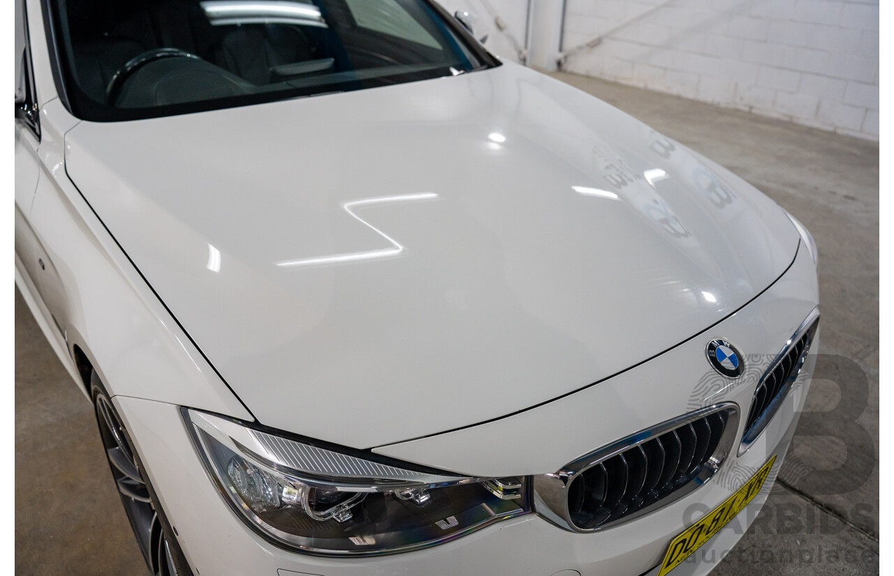 9/2014 BMW 328i Gran Turismo Sport F34 MY15 4d Coupe Alpine White Turbo 2.0L