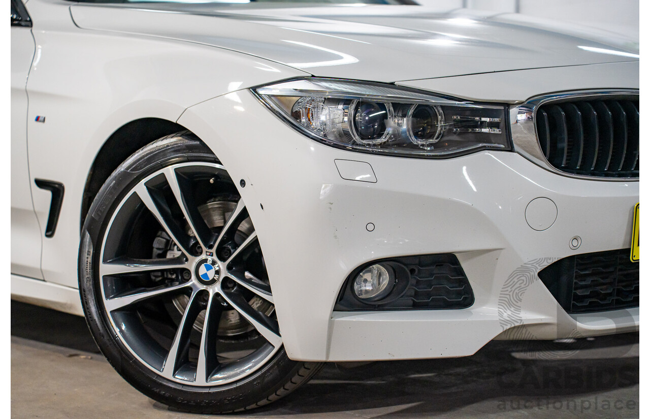 9/2014 BMW 328i Gran Turismo Sport F34 MY15 4d Coupe Alpine White Turbo 2.0L