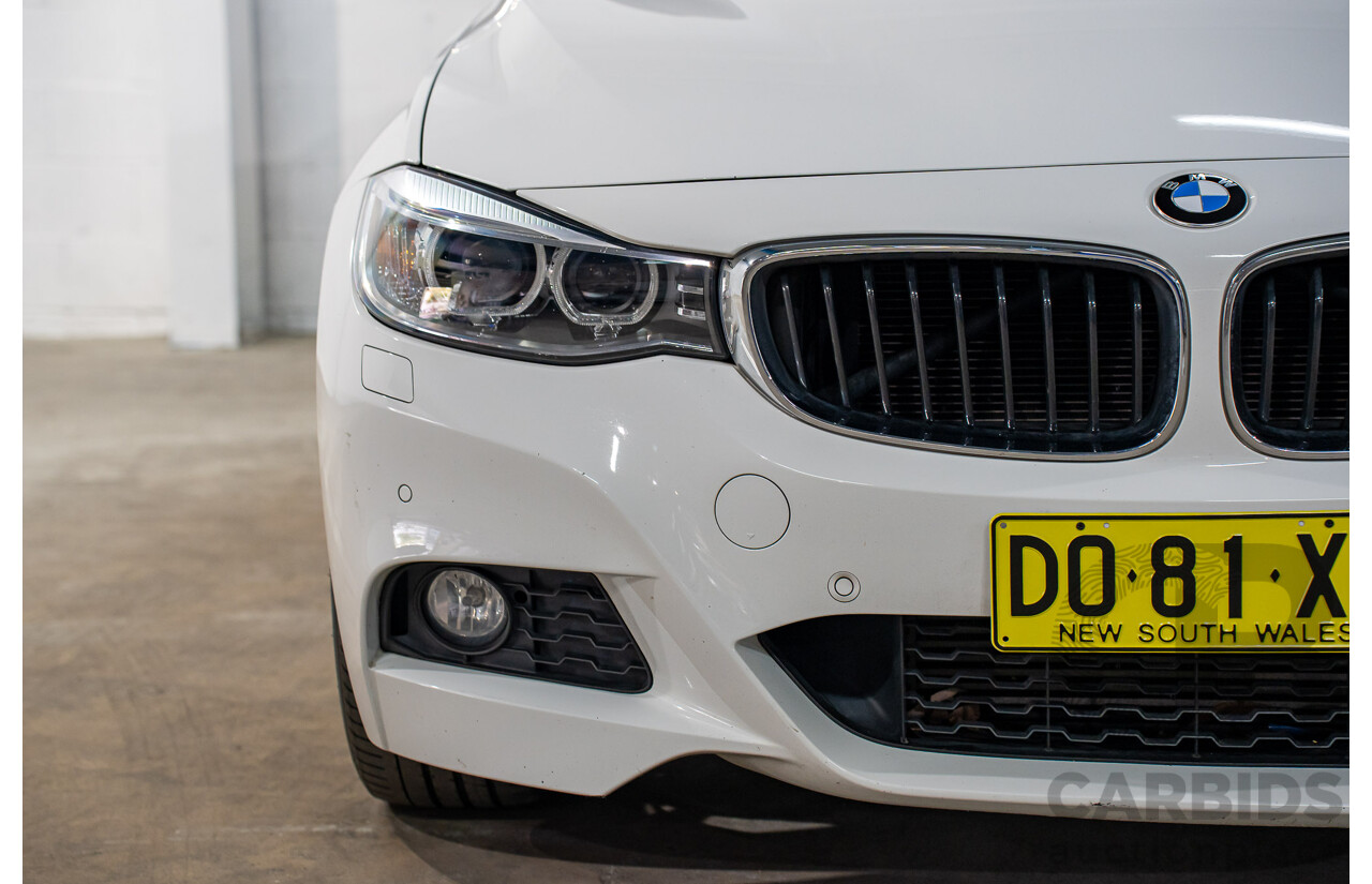 9/2014 BMW 328i Gran Turismo Sport F34 MY15 4d Coupe Alpine White Turbo 2.0L