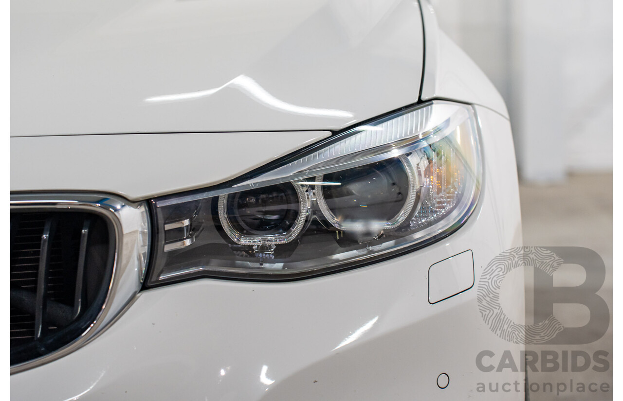 9/2014 BMW 328i Gran Turismo Sport F34 MY15 4d Coupe Alpine White Turbo 2.0L