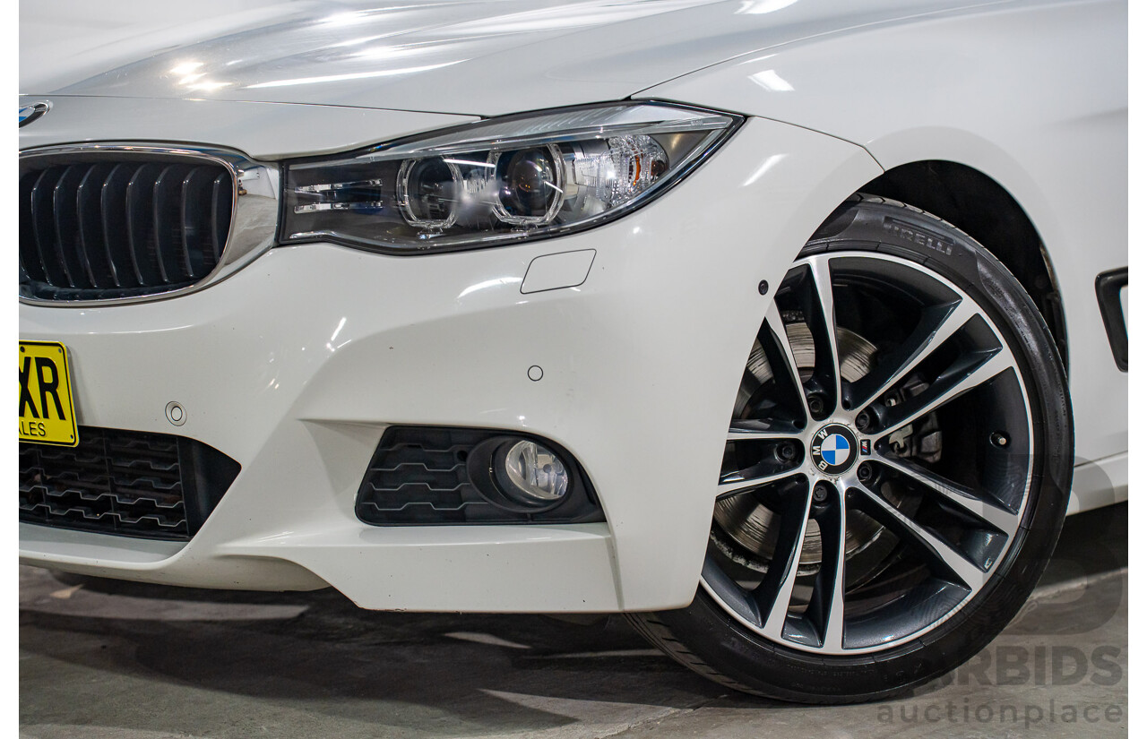 9/2014 BMW 328i Gran Turismo Sport F34 MY15 4d Coupe Alpine White Turbo 2.0L