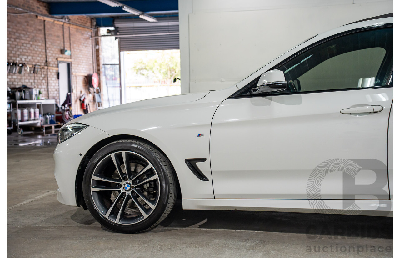 9/2014 BMW 328i Gran Turismo Sport F34 MY15 4d Coupe Alpine White Turbo 2.0L