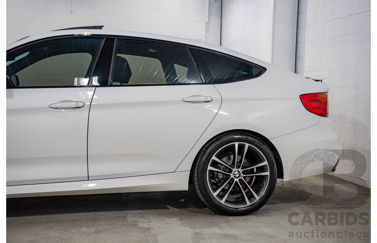 9/2014 BMW 328i Gran Turismo Sport F34 MY15 4d Coupe Alpine White Turbo 2.0L