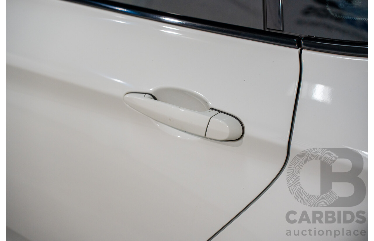 9/2014 BMW 328i Gran Turismo Sport F34 MY15 4d Coupe Alpine White Turbo 2.0L