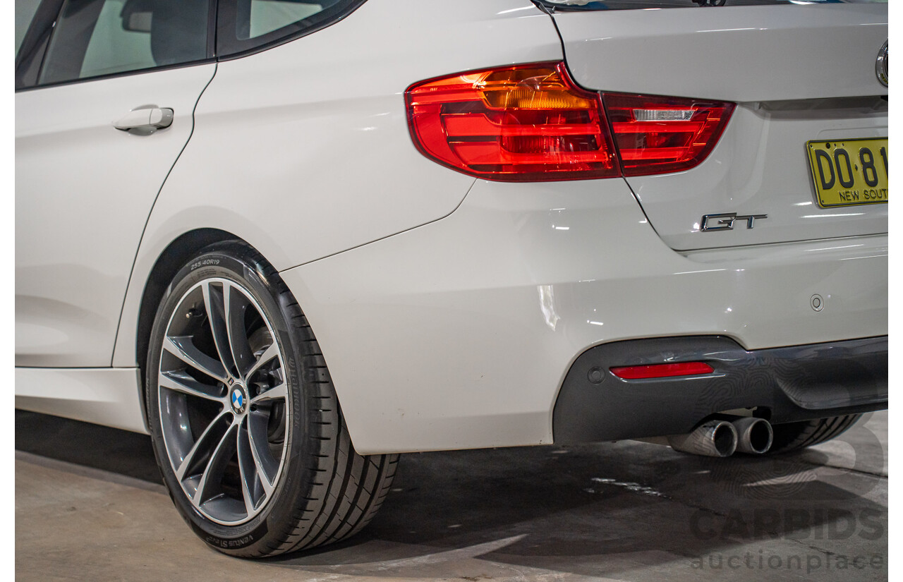 9/2014 BMW 328i Gran Turismo Sport F34 MY15 4d Coupe Alpine White Turbo 2.0L