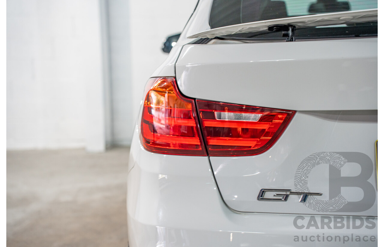 9/2014 BMW 328i Gran Turismo Sport F34 MY15 4d Coupe Alpine White Turbo 2.0L