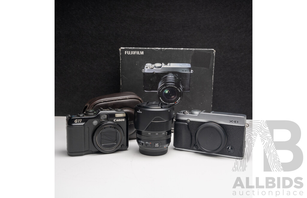 FujiFilm X-E1 Digital Camera with Fujinon Aspherical Super EBC XF 18–55mm F/2.8–4 Lens and Charger, with Canon PowerShot G11 Digital Camera with Leather Case and Charger