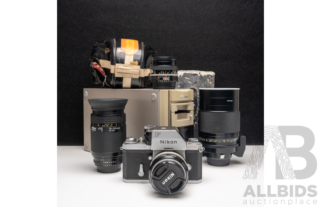 Nikon F Camera with 50mm F/1.4 Lens, Nikon 20mm F/3.5 Lens, Nikon 70–210mm F/4–5.6 Lens, Nikon 500mm F/8 Mirror Lens and Nikon CoolScan IV Digital Scanner