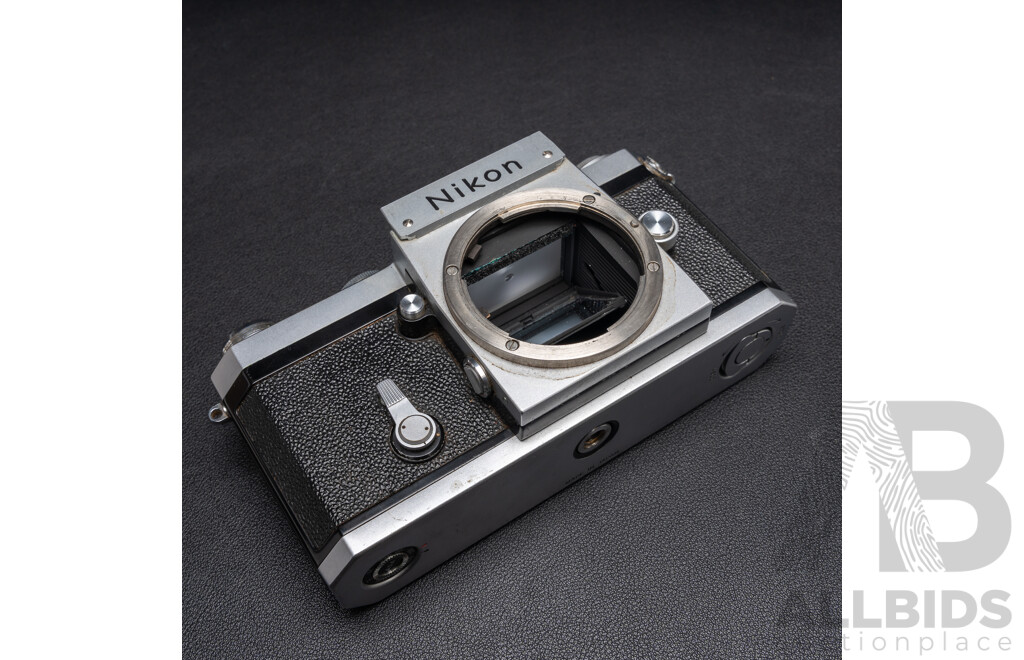 Nikon F Camera with 50mm F/1.4 Lens, Nikon 20mm F/3.5 Lens, Nikon 70–210mm F/4–5.6 Lens, Nikon 500mm F/8 Mirror Lens and Nikon CoolScan IV Digital Scanner