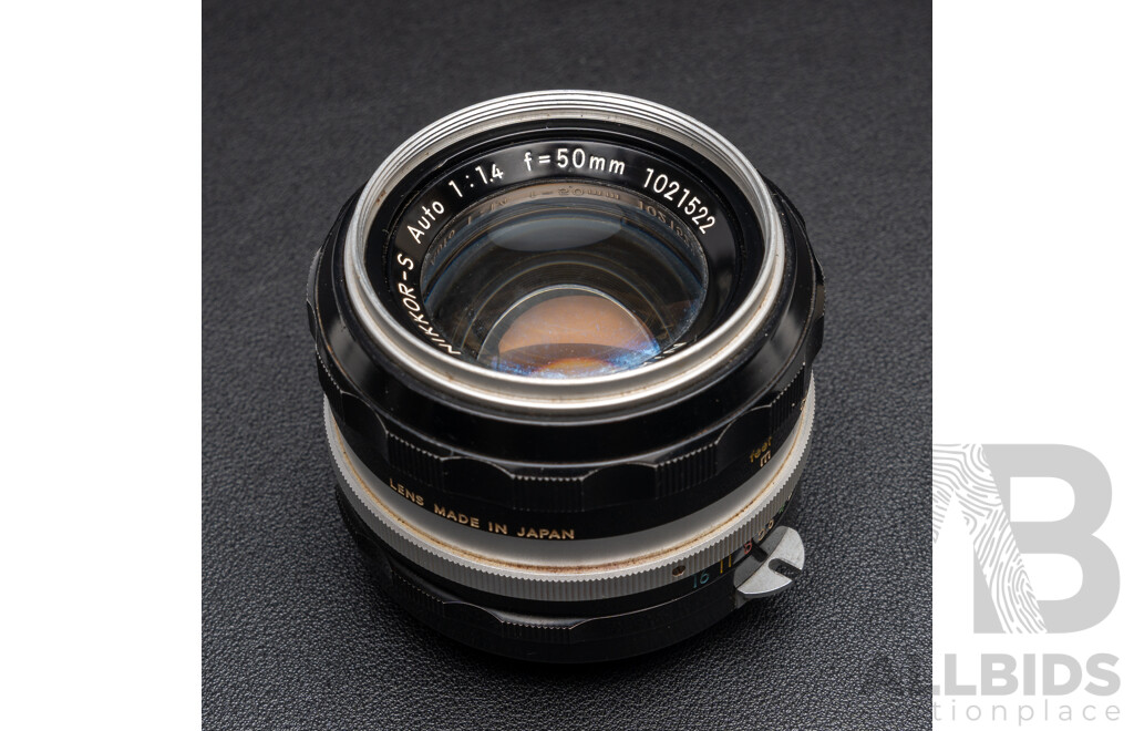 Nikon F Camera with 50mm F/1.4 Lens, Nikon 20mm F/3.5 Lens, Nikon 70–210mm F/4–5.6 Lens, Nikon 500mm F/8 Mirror Lens and Nikon CoolScan IV Digital Scanner