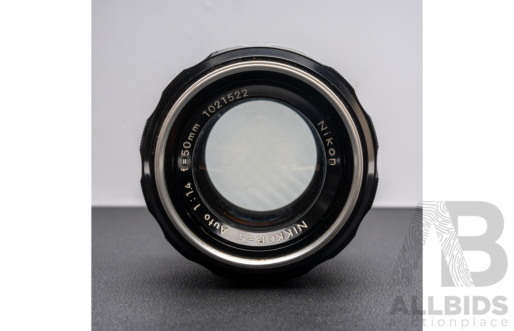 Nikon F Camera with 50mm F/1.4 Lens, Nikon 20mm F/3.5 Lens, Nikon 70–210mm F/4–5.6 Lens, Nikon 500mm F/8 Mirror Lens and Nikon CoolScan IV Digital Scanner