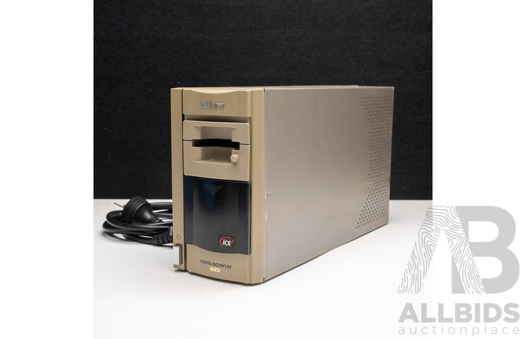 Nikon F Camera with 50mm F/1.4 Lens, Nikon 20mm F/3.5 Lens, Nikon 70–210mm F/4–5.6 Lens, Nikon 500mm F/8 Mirror Lens and Nikon CoolScan IV Digital Scanner