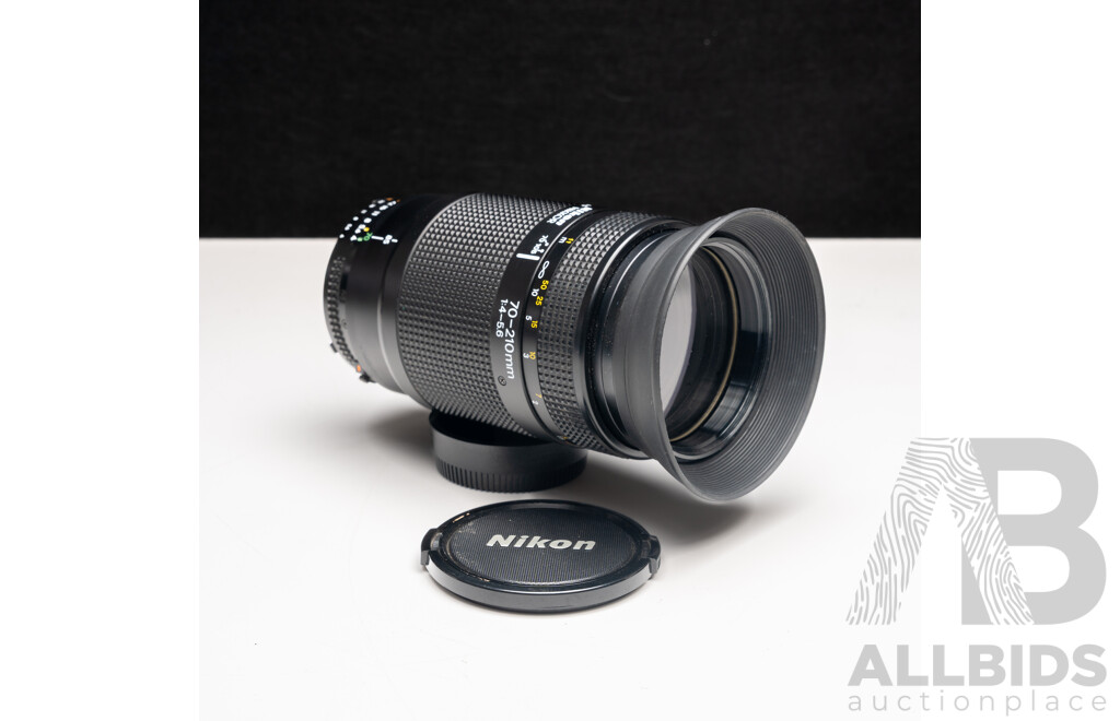 Nikon F Camera with 50mm F/1.4 Lens, Nikon 20mm F/3.5 Lens, Nikon 70–210mm F/4–5.6 Lens, Nikon 500mm F/8 Mirror Lens and Nikon CoolScan IV Digital Scanner