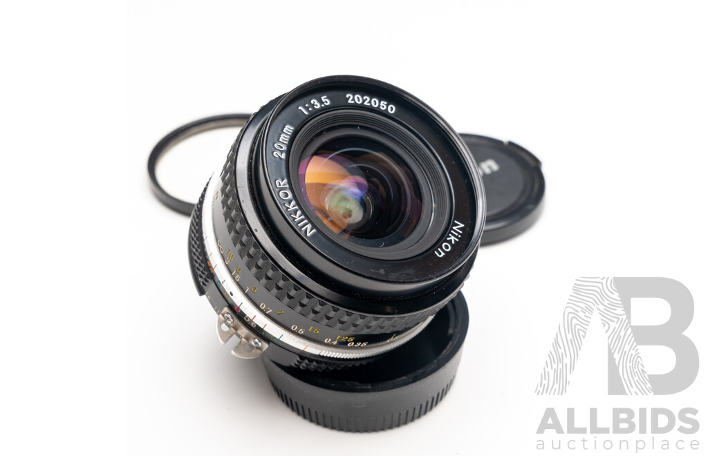 Nikon F Camera with 50mm F/1.4 Lens, Nikon 20mm F/3.5 Lens, Nikon 70–210mm F/4–5.6 Lens, Nikon 500mm F/8 Mirror Lens and Nikon CoolScan IV Digital Scanner