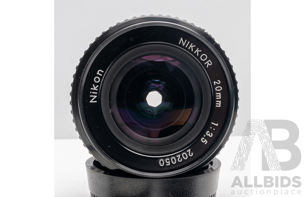 Nikon F Camera with 50mm F/1.4 Lens, Nikon 20mm F/3.5 Lens, Nikon 70–210mm F/4–5.6 Lens, Nikon 500mm F/8 Mirror Lens and Nikon CoolScan IV Digital Scanner