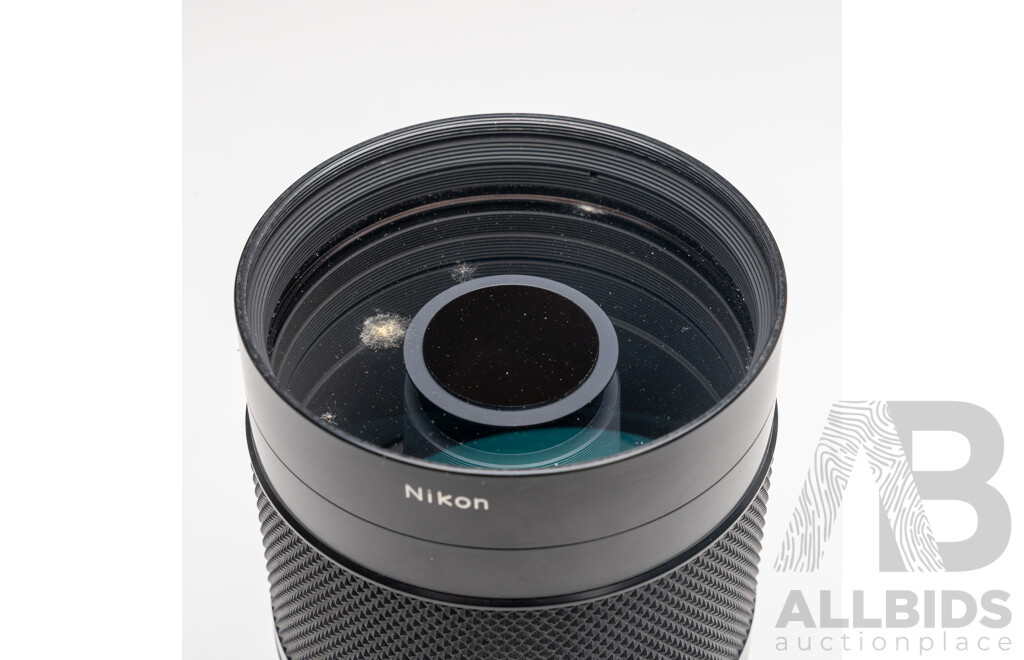 Nikon F Camera with 50mm F/1.4 Lens, Nikon 20mm F/3.5 Lens, Nikon 70–210mm F/4–5.6 Lens, Nikon 500mm F/8 Mirror Lens and Nikon CoolScan IV Digital Scanner