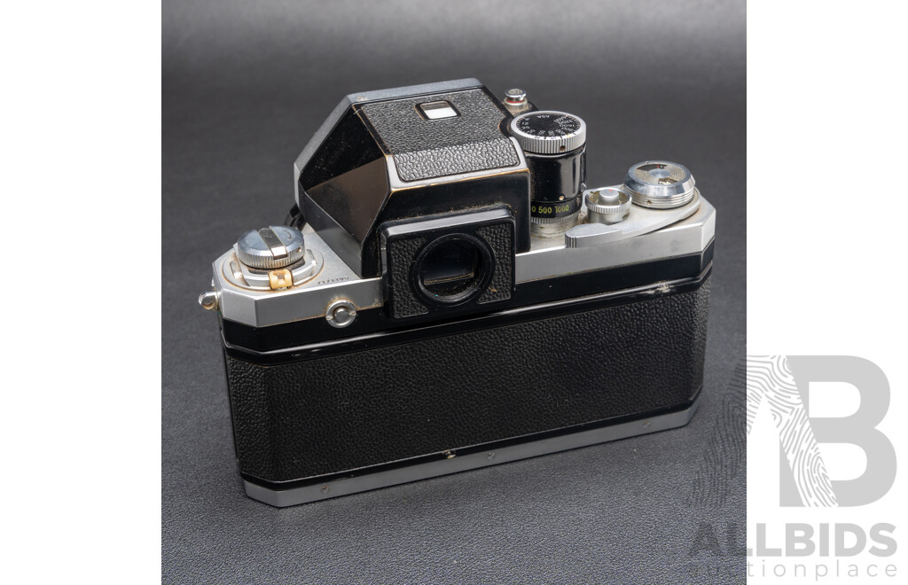 Nikon F Camera with 50mm F/1.4 Lens, Nikon 20mm F/3.5 Lens, Nikon 70–210mm F/4–5.6 Lens, Nikon 500mm F/8 Mirror Lens and Nikon CoolScan IV Digital Scanner