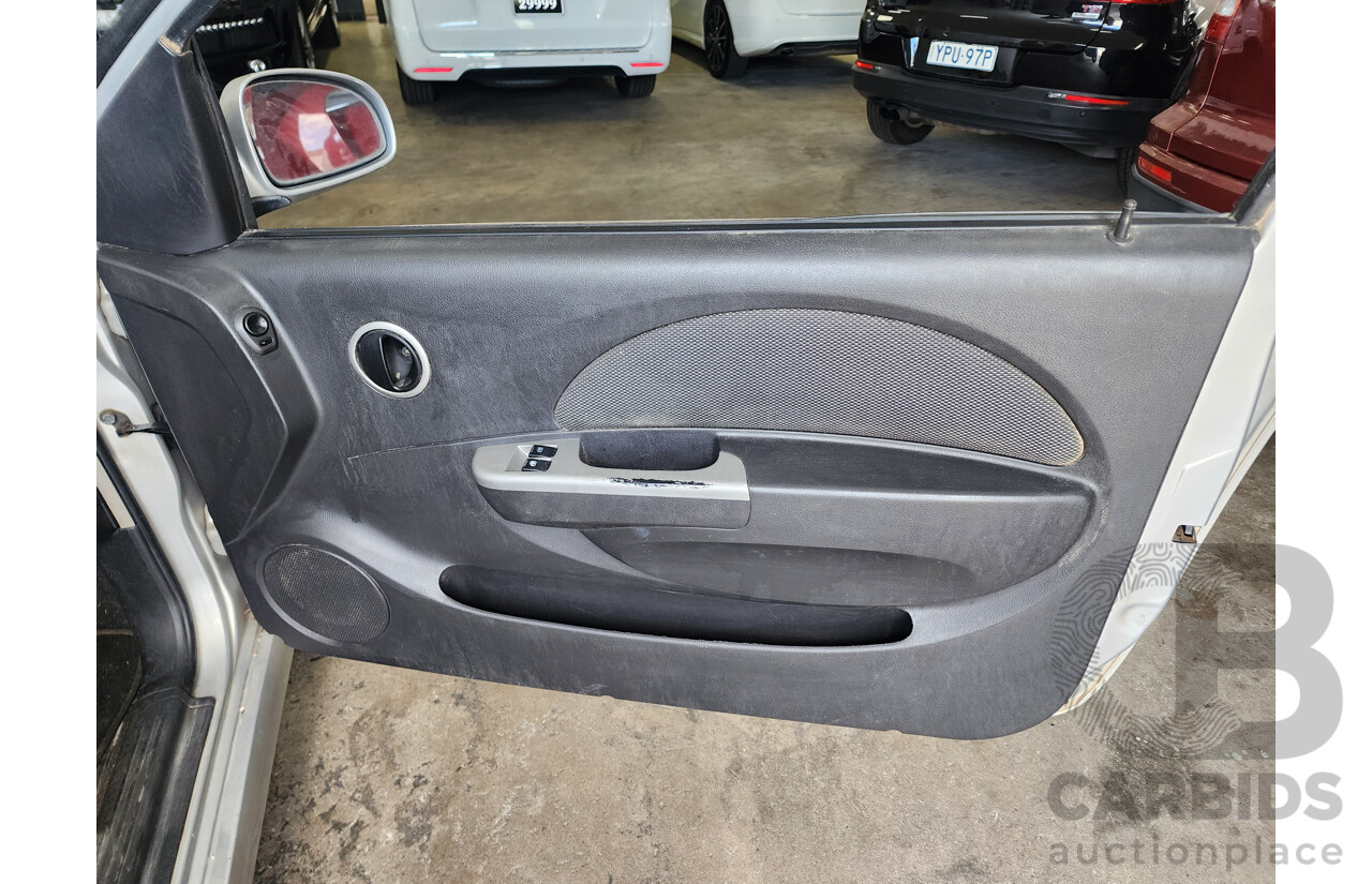 9/2007 Holden Barina  TK MY07 3d Hatchback Silver 1.6L
