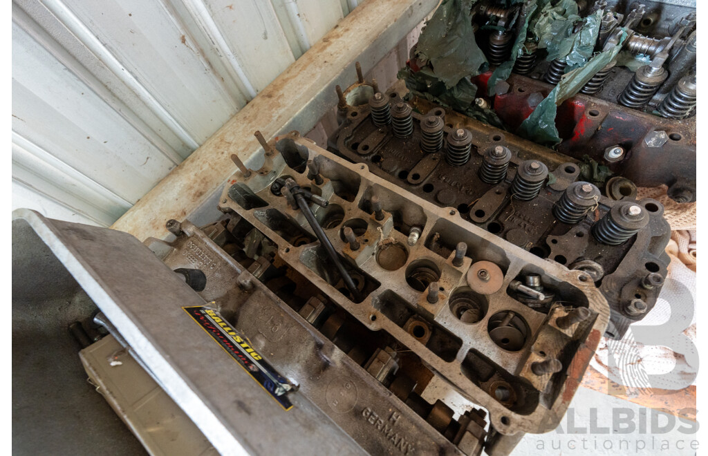 Collection of Five Assorted Engine Cylinder Heads