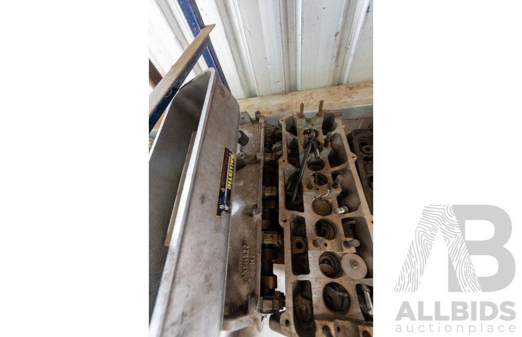 Collection of Five Assorted Engine Cylinder Heads